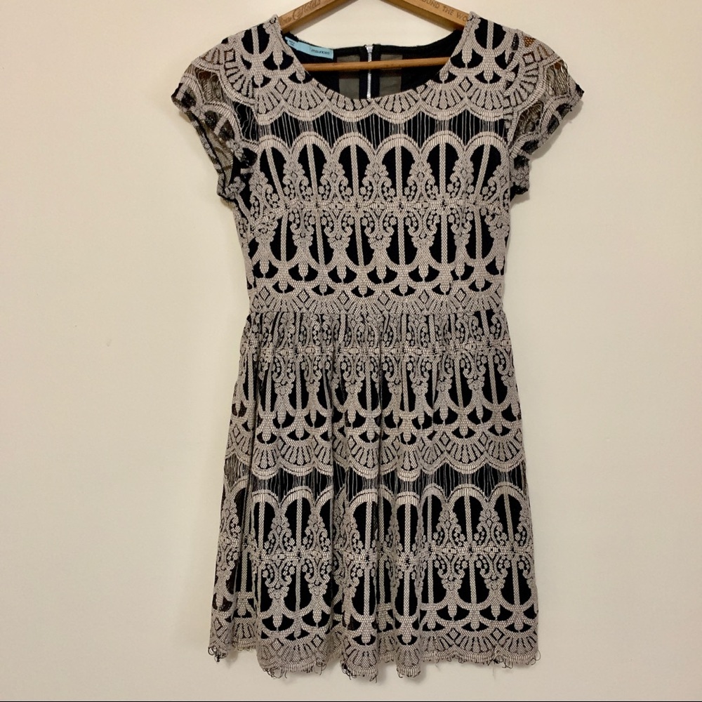Maurice’s black and white open weave dress.